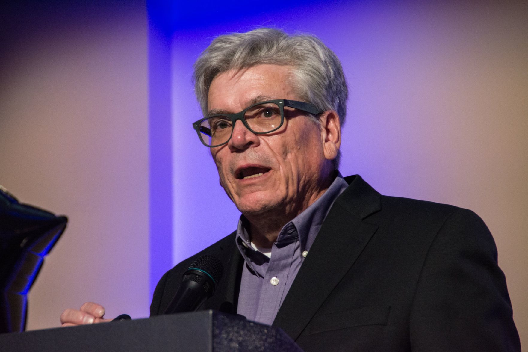 Mark Shields, CEO, COO of ARCHway Institute speaks at the event